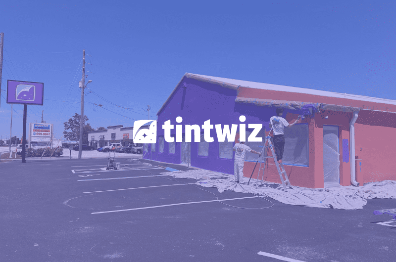 Freshly painted Wiz Castle, transformed from a boring exterior to vibrant Tint Wiz purple